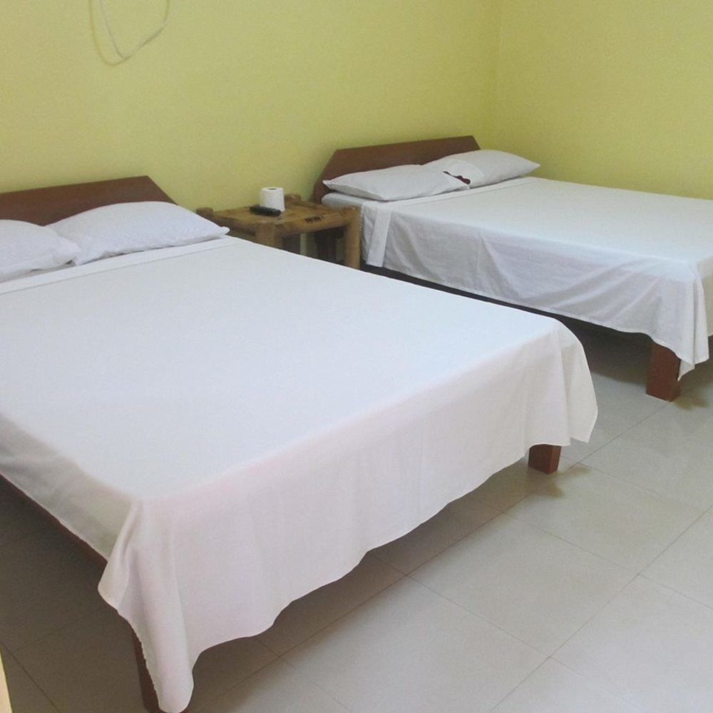 Tawala  Alona Grove Tourist Inn מראה חיצוני תמונה
